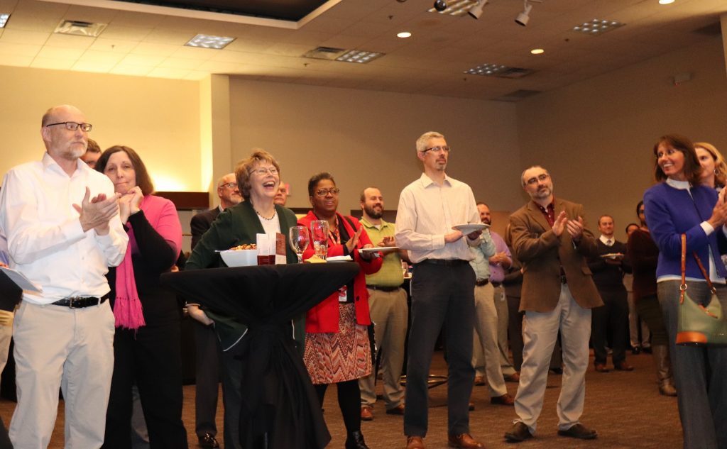 CP Tech Program Coordinator Sharon Prochnow reacts to receiving an award for her tenure with InTrans.