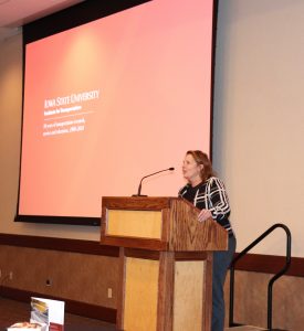 InTrans Director Shauna Hallmark welcomes the crowd to the celebration.