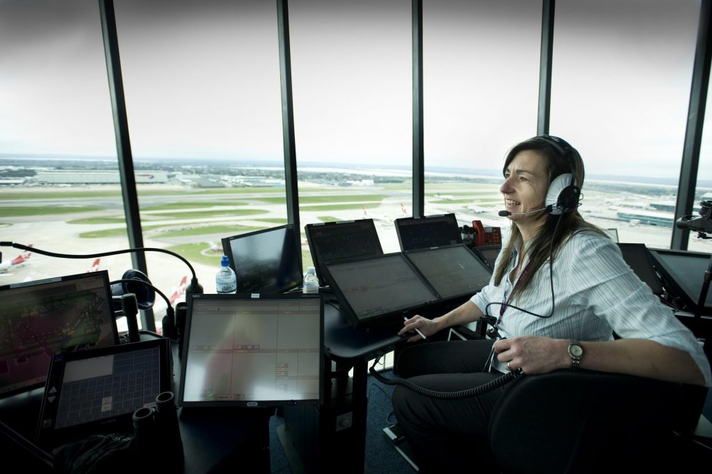 Tower controller inside air traffic control tower