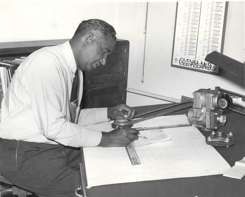 Frederick McKinley Jones at a drafting table