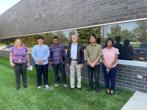 InTrans staff and graduate students with Dan Shechtman (center)