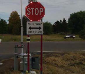 Flashing LEDs around stop sign face