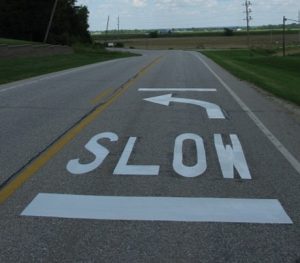 On-pavement curve signing on Des Moines CR 99