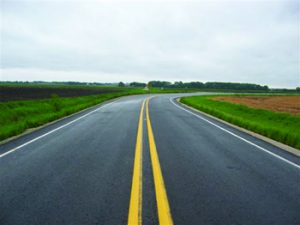 Partial shoulders throughout curve on rural Iowa highway